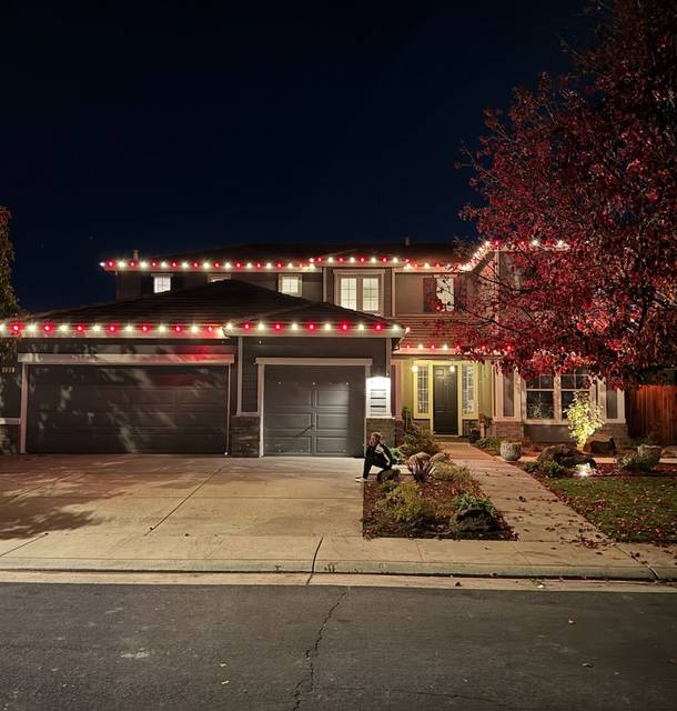 christmas lights installation on a house