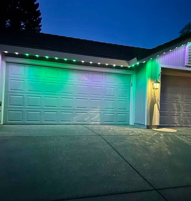 christmas lights installation on a house