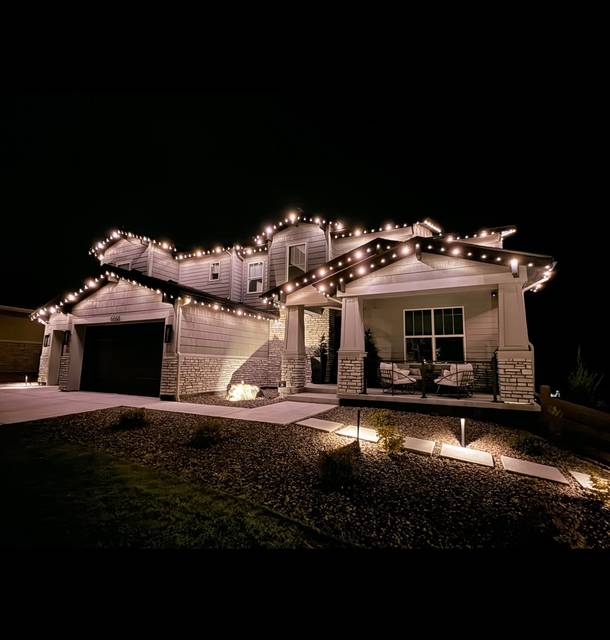 christmas lights installation on a house
