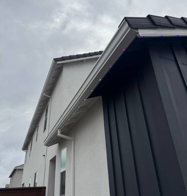 christmas lights installation on a house