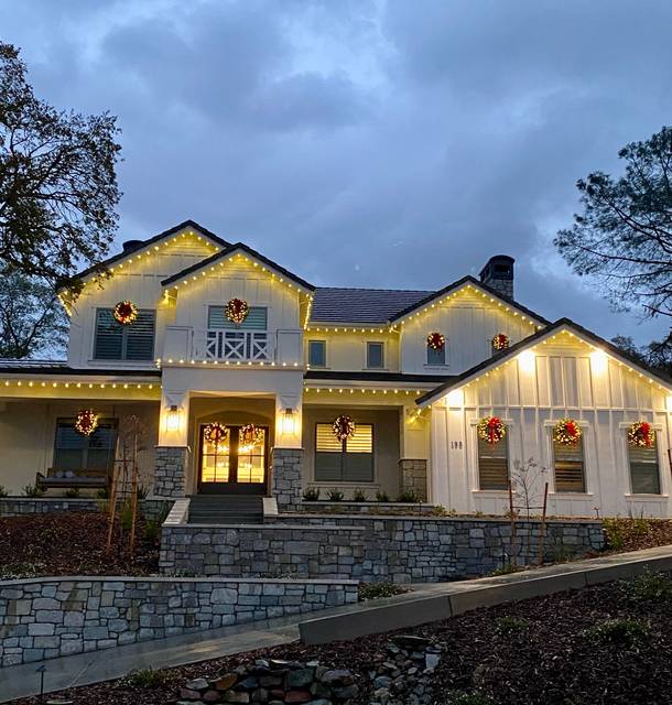 christmas lights installation on a house