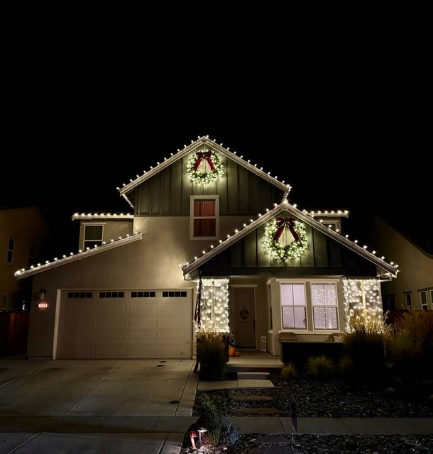 christmas lights installation on a house
