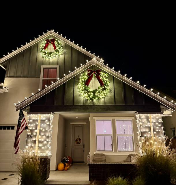 christmas lights installation on a house